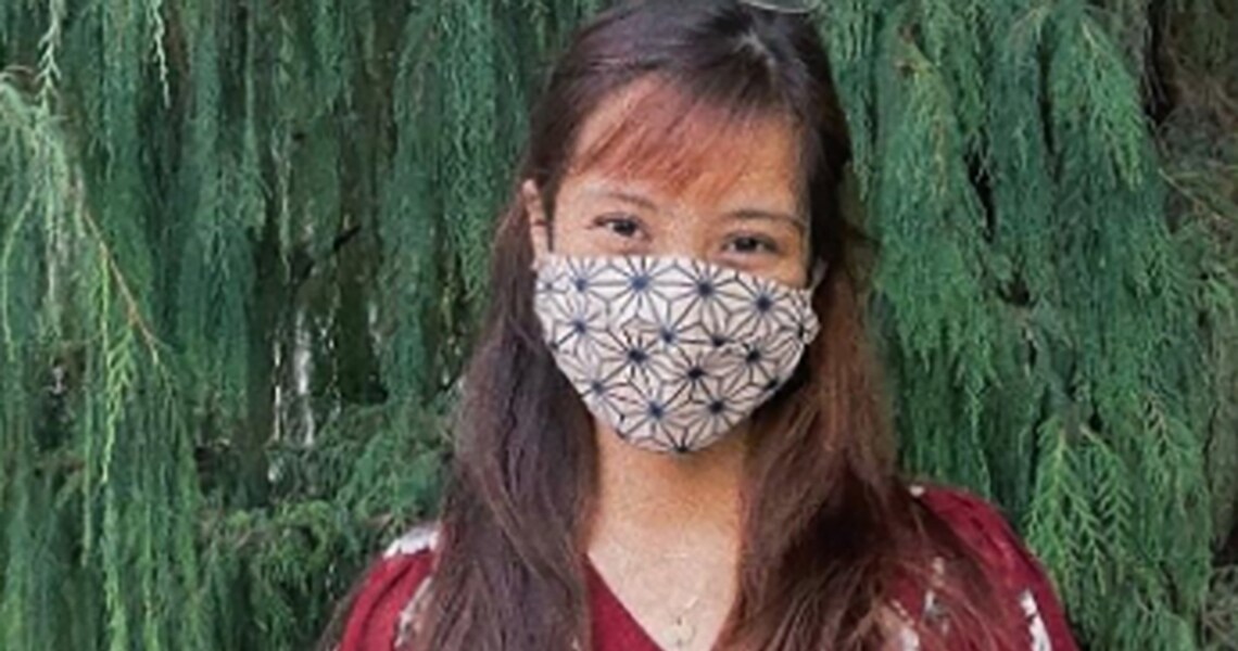 Close up of a young lady wearing the mask