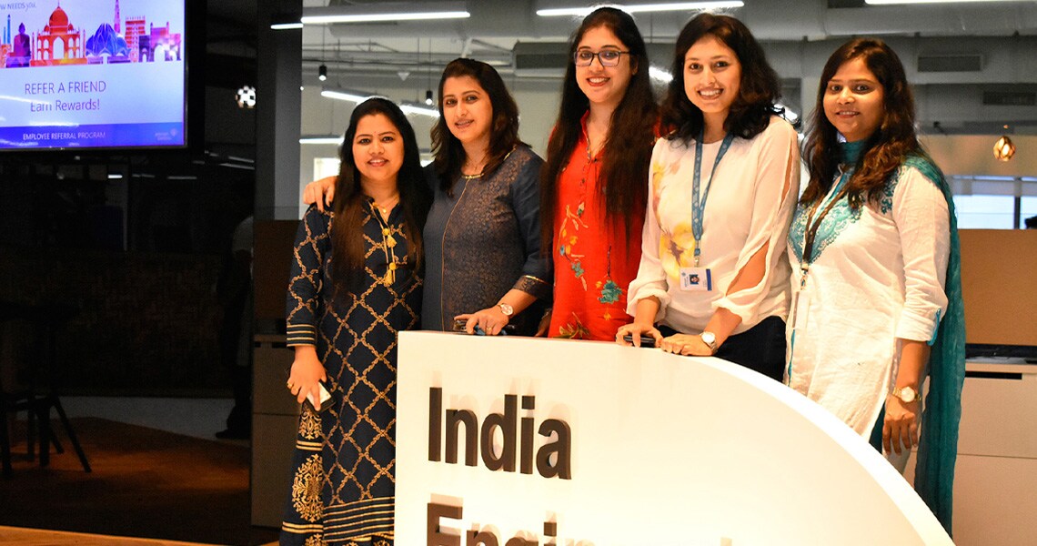 Johnson Controls employee Pallavi Talim along with other employees at an event