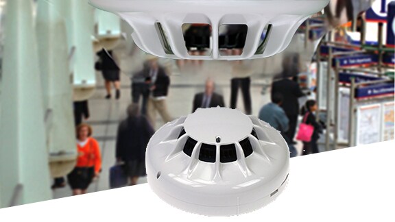 Smoke detector mounted on a wall