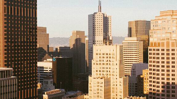 Aerial view of a city filled with tall building in the daylight