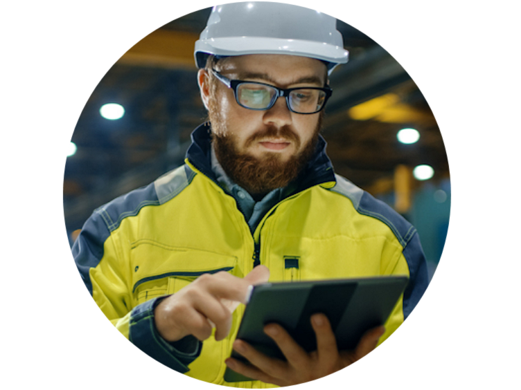 Close up view of an engineer in uniform looking at his tab