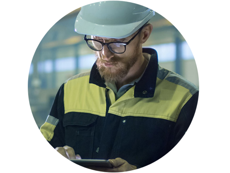 Close-up of an technician making notes on tab