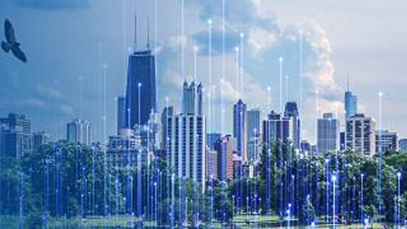 View of city's high rise buildings in daylight overlaid with graphics of transmission nodes