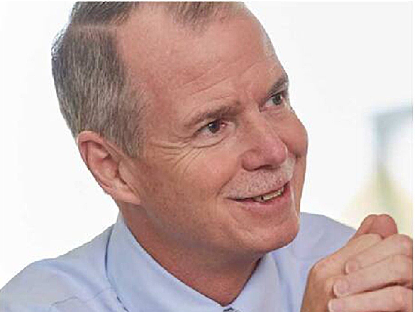 George R. Oliver, the Chairman and CEO of Johnson Controls