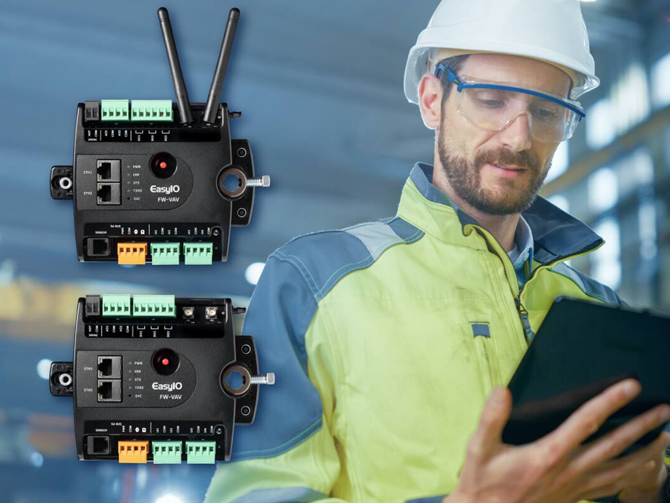 A worker monitoring with a tab in the hand with the Easy IO component in the foreground
