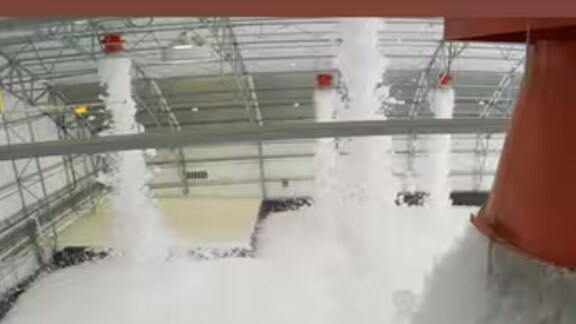 Foam systems activated in an industrial space