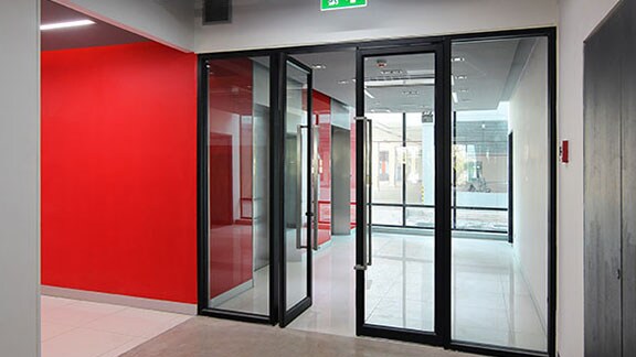 a glass emergency exit door of a building